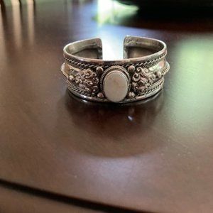 Sterling Silver Made in Mexico cuff braclet with white opal